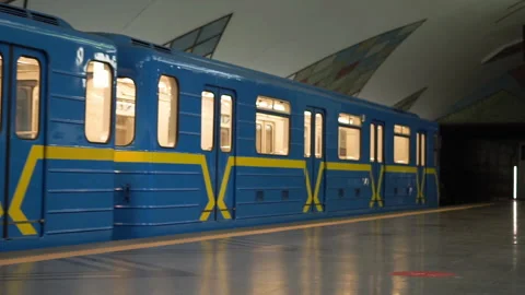 Empty wagon of subway, doors closing, train moves from the station Stock Footage 204790981