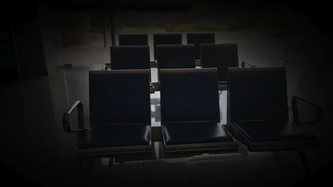 Empty Waiting Room Chairs In Dark Moody Interior Hall Stock Footage 331492657