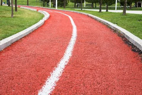 Empty walking / running track along the park Stock Photos