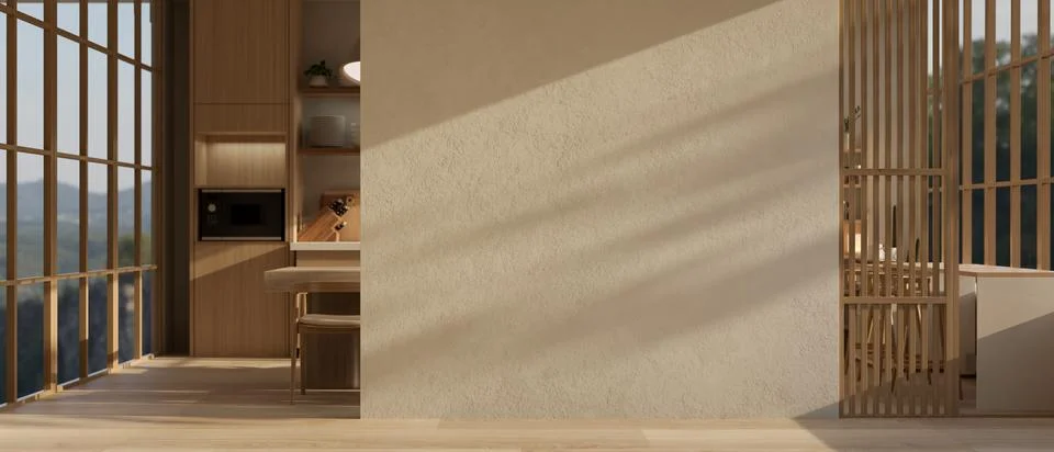 An empty wall in a modern, spacious apartment room with a kitchen in the back Ilustración de archivo