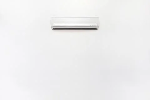 Empty wall mounted white color inverter air conditioner Stock Photos