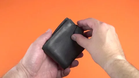 Empty wallet in hands Stock Footage 134425224
