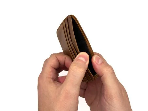 An Empty wallet in the hands of a man isolated on white background, wealth Stock Photos