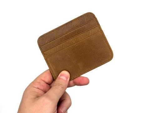 An Empty wallet in the hands of a man isolated on white background, wealth Stock Photos