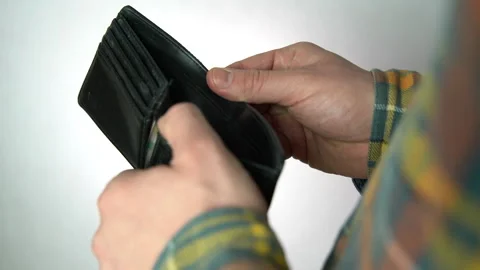 Empty wallet in man's hand on white background Stock Footage 160826316