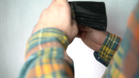 Empty wallet in man's hand on white background Stock Footage 160826338