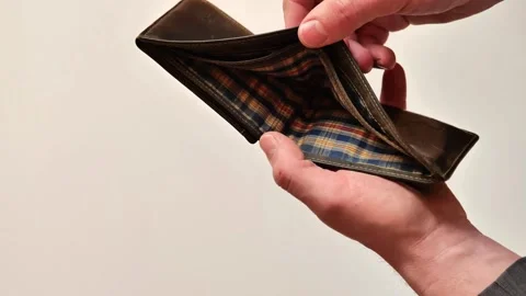 Empty wallet.lack and shortage of money.A mans hands open an empty wallet Stock Footage 336809672