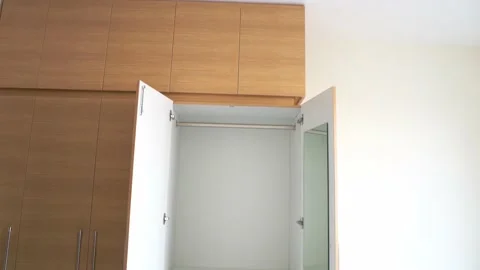 Empty Wardrobe with mirror on the door Stock Footage 149940130