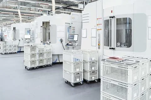 Empty warehouse interior with shelves, pallets, boxes and equipment Stock Photos