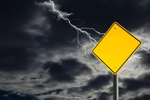 Empty Warning Sign Against Cloudy and Thunderous Sky Stock Photos