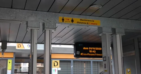 Empty water bus stop station with information about maintaining distance Venice Stock Footage 150388406