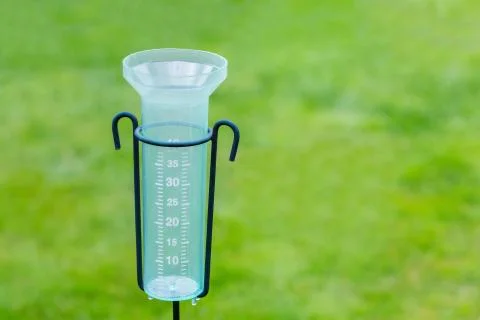 Empty water meter with grass background Stock Photos