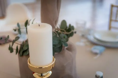 Empty Wedding Reception Hall Decorated With White Candle and Eucalyptus Stock Photos