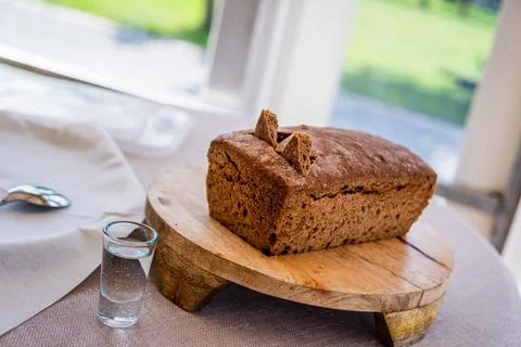 Empty Wedding Reception Hall With Loaf of Rye Bread on Wooden Serving Tray Stock Photos
