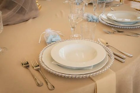 Empty Wedding Reception Hall Table Setting With Silver Charger Plates Stock Photos