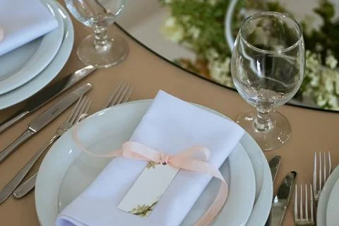 Empty Wedding Reception Hall Table Setting With glasses and Plates Stock Photos