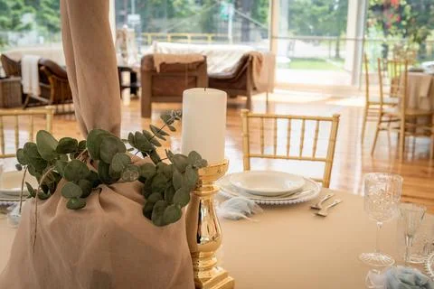 Empty Wedding Reception Hall With White Candle and Gold Candelabra Stock Photos
