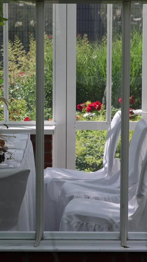 Empty wedding venue with covered tables and chairs Stock Footage 340506492