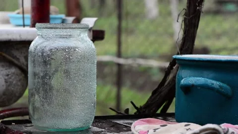Empty wet glass jar Stock Footage 152789000