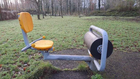 Empty Wet Park Exercise Equipment Autumn UHD Stock Footage 263886047