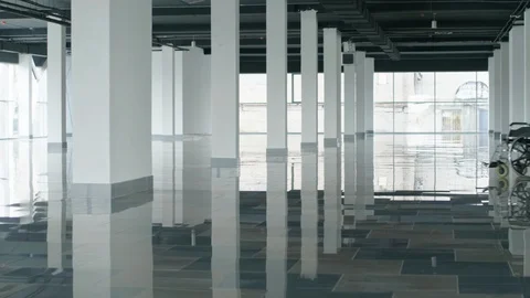 Empty wheelchair moving through corridor Stock Footage 125709084