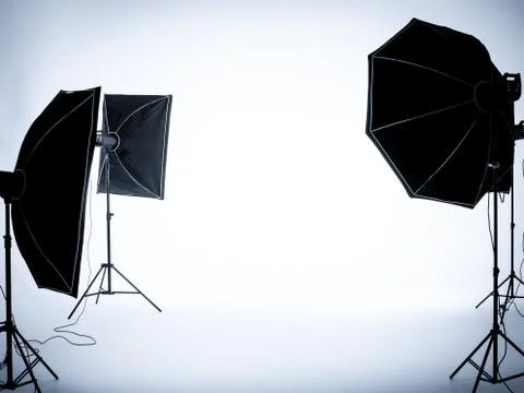 Empty white background in photography studio interior with lighting set up. 写真素材