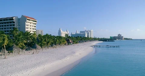 Empty white beach and hotels fly out Stock-Footage 128473503