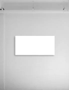 Empty white blank rectangle sign frame mounted on white wall in the hotel o.. Foto stock