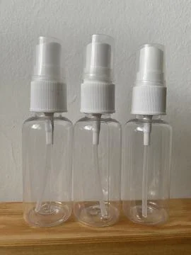 Empty white bottle spray container close up Stock Photos