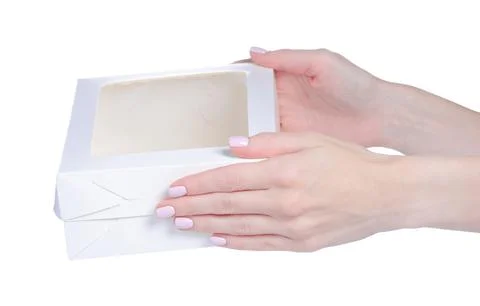 Empty white box for eclair in hand Stock Photos