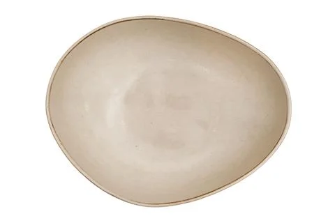Empty white ceramic bowl with irregular shape. Minimalist kitchenware for f.. Stockfoto's
