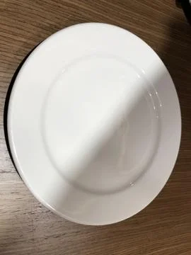 Empty White Ceramic Dinner Plate Top Angle View Stock Photos