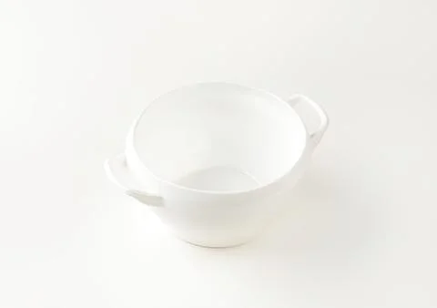 Empty white ceramic mixing bowl with handle Photos