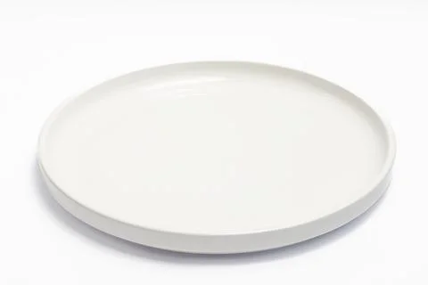 Empty White Ceramic Plate Isolated on White Background, Round Porcelain Din.. Stock Photos