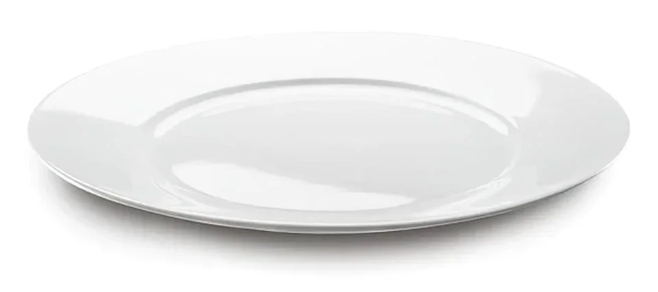 Empty white ceramic plate on plain background Stock Photos