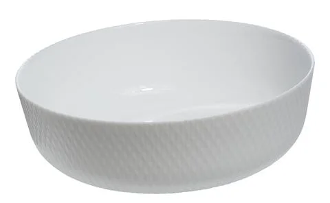 Empty white ceramic round salad plate on isolated background Stock Photos