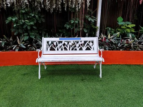 Empty white chair in the park Stock Photos