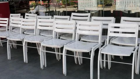 An empty white chair Stock Photos