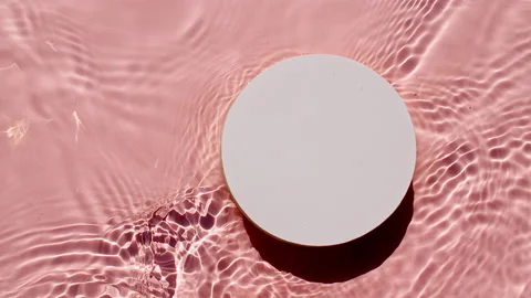Empty white circle podium on transparent clear water texture with waves in Stock-Footage 219604842