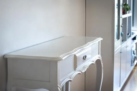 Empty white classic console in a modern room Stock Photos