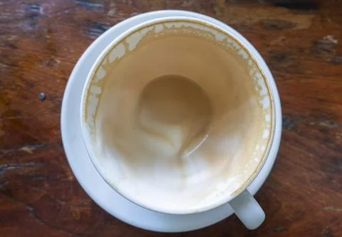 Empty of a white cup of coffee after drink Stock Photos