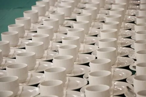 The empty white cups with spoons without brand for coffee or hot tea Stock Photos