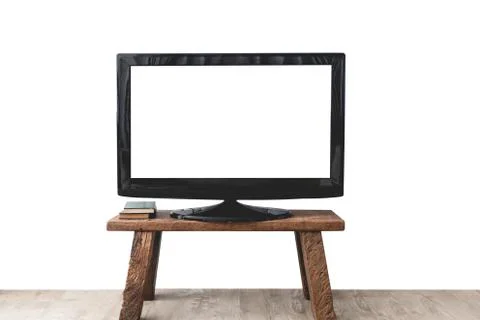 Empty white flat TV screen on wood stand . Stock Photos