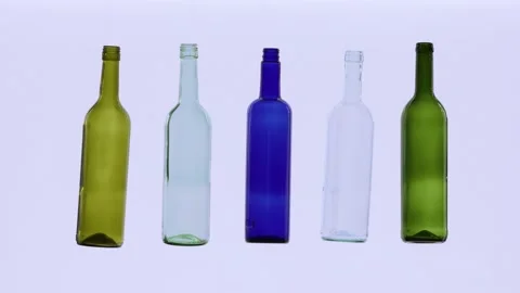 Empty white green and blue bottles are dancing Stock Footage 142442414