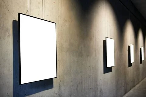 Empty white isolated frame Row of empty black frames on concrete wall in t... Stock Photos