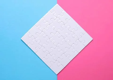 Empty white jigsaw puzzle piece on colorful background Foto stock