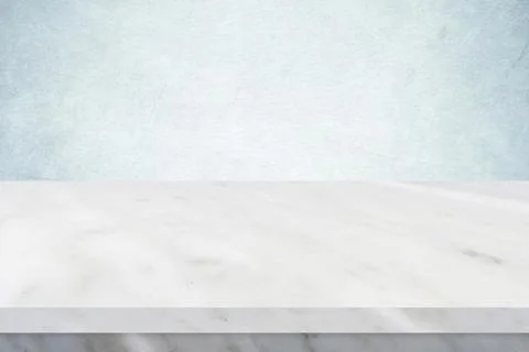 Empty white marble table over green cement wall background, banner, table top Stock Photos