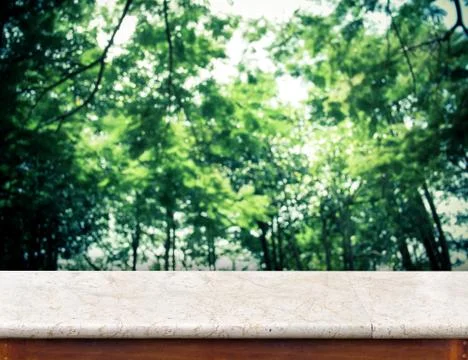 Empty white marble Table top at blurred group of trees ,Template mock up fo.. Stock Photos