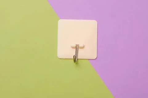 Empty white note pad with metal clip on colorful background Stock Photos