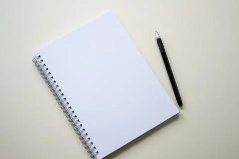 Empty white notepad with black pen. with space for your text. Stock Photos